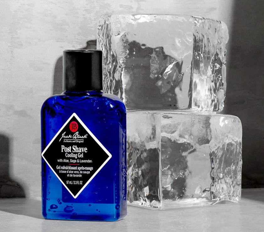 Blue bottle of Jack Black post-shave cooling gel next to blocks of ice.