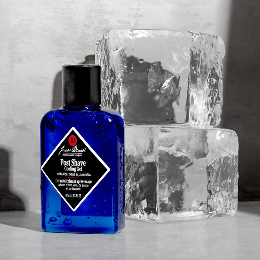 Blue bottle of Jack Black post-shave cooling gel next to blocks of ice.