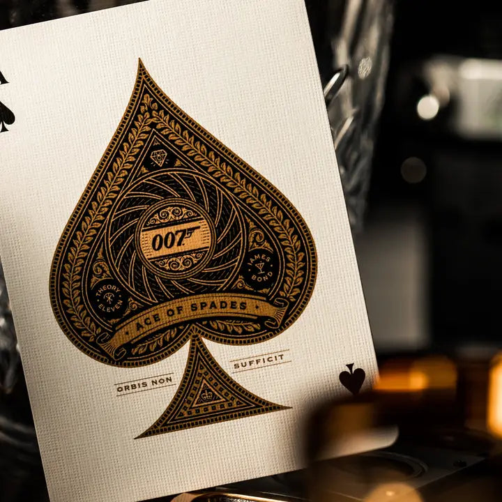 Playing card with a detailed spade design featuring '007' on a white background.