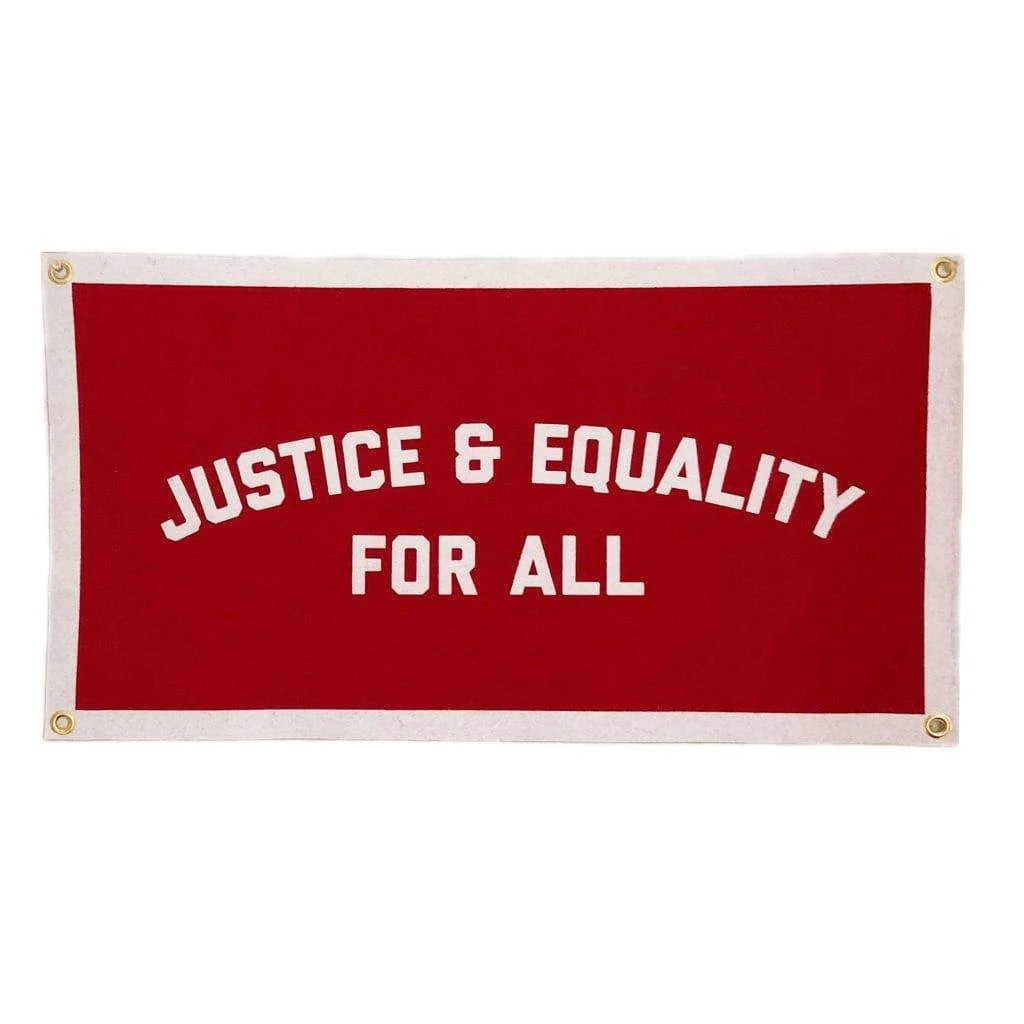 A red banner with a white border with the phrase "Justice and equality for all" on it.