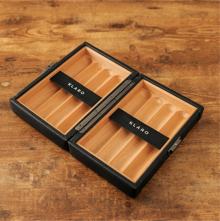Open cigar case to show spanish cedar interior.