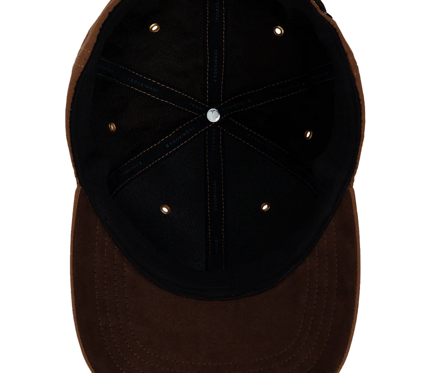 The interior of a Kooringal men's ball cap in the color rust.