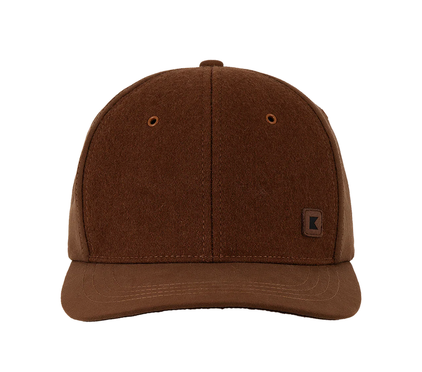 The front of a Kooringal ball cap in the color rust.