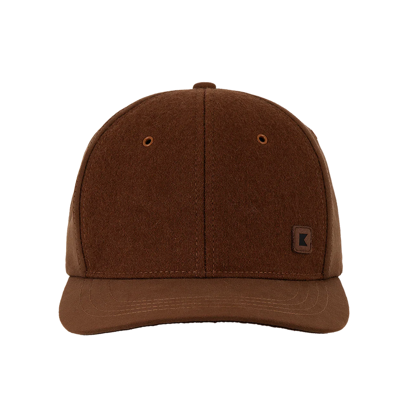 The front of a Kooringal ball cap in the color rust.