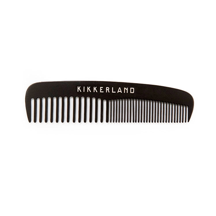 Black comb with 'Kikkerland' branding on a white background