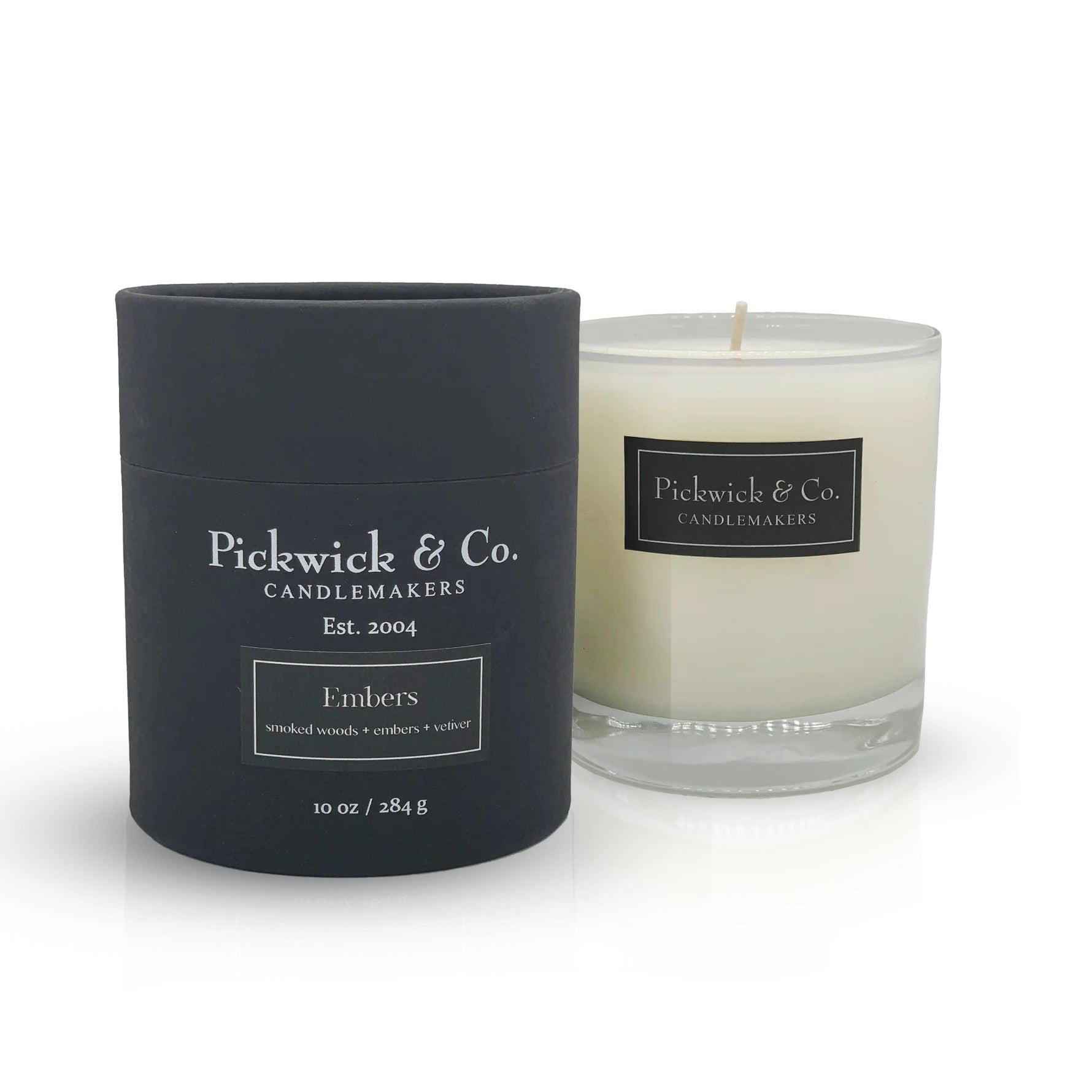 Black candle container and white candle with 'Pickwick & Co. Candlemakers' label on a white background.