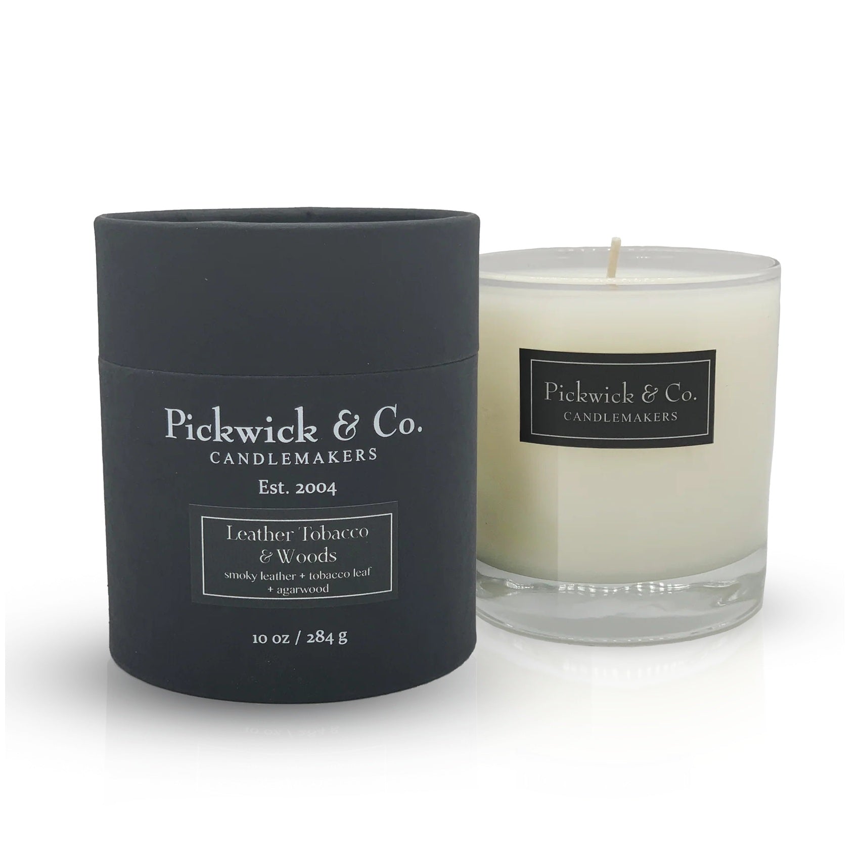 Pickwick & Co. candle and black container on a white background
