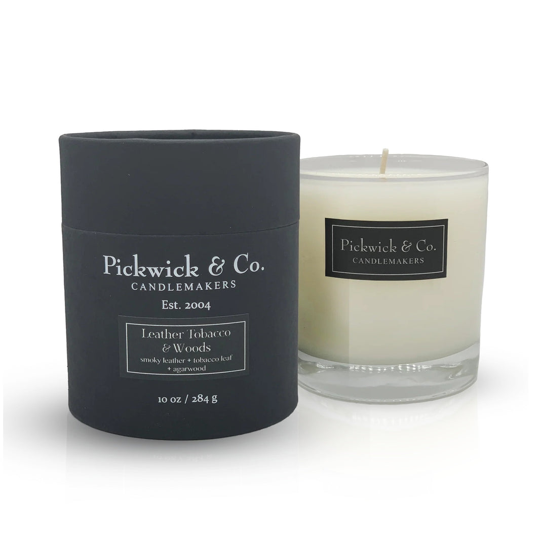 Pickwick & Co. candle and black container on a white background