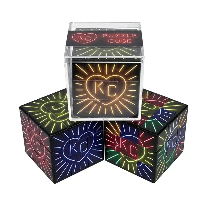 Neon puzzle cubes with 'KC' design on a white background