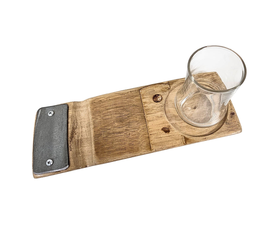 Wooden cigar tray with a glass on a white surface