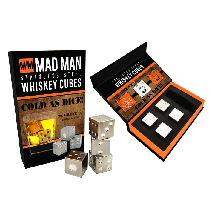 Stainless steel whiskey cubes etched to look like playing dice sitting beside the Mad Man packaging, and next to an open package with the same whiskey cubes inside.