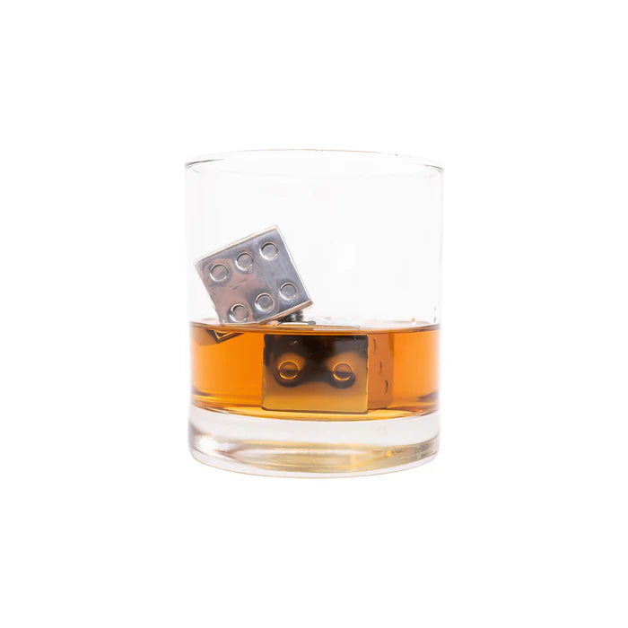 Stainless steel whiskey cubes etched to look like playing dice in a glass of whiskey.