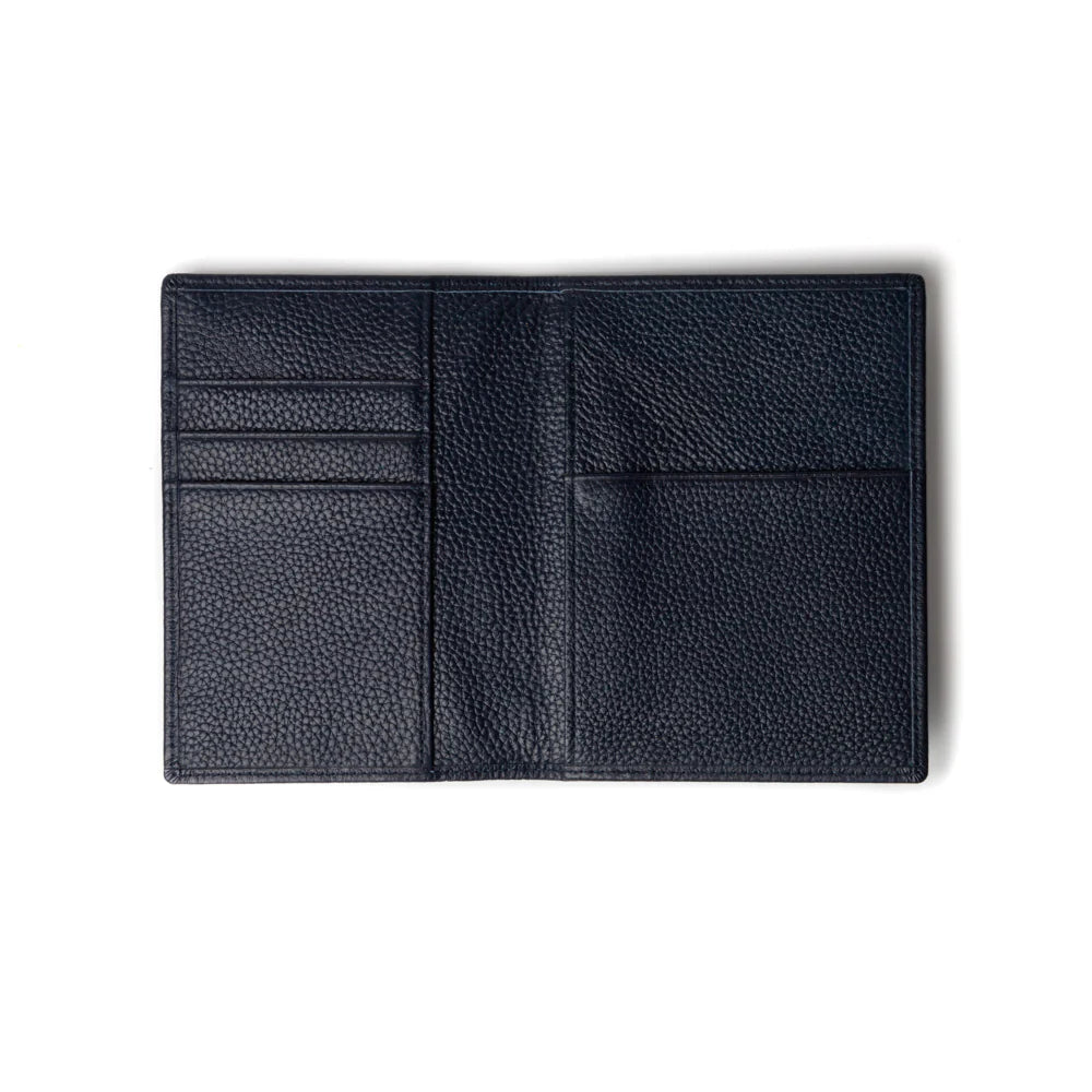 Blue leather passport wallet on a white background