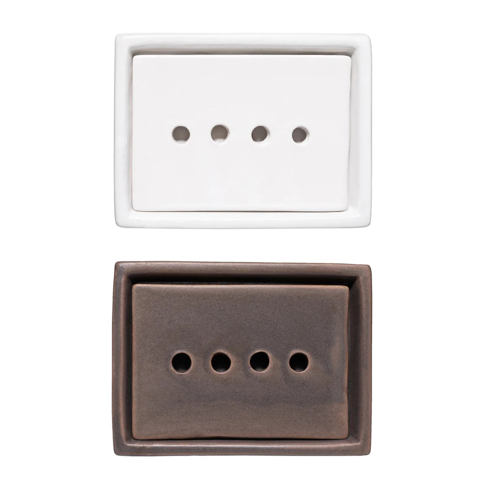 White and brown stoneware soap dishes with removable trays on a white background