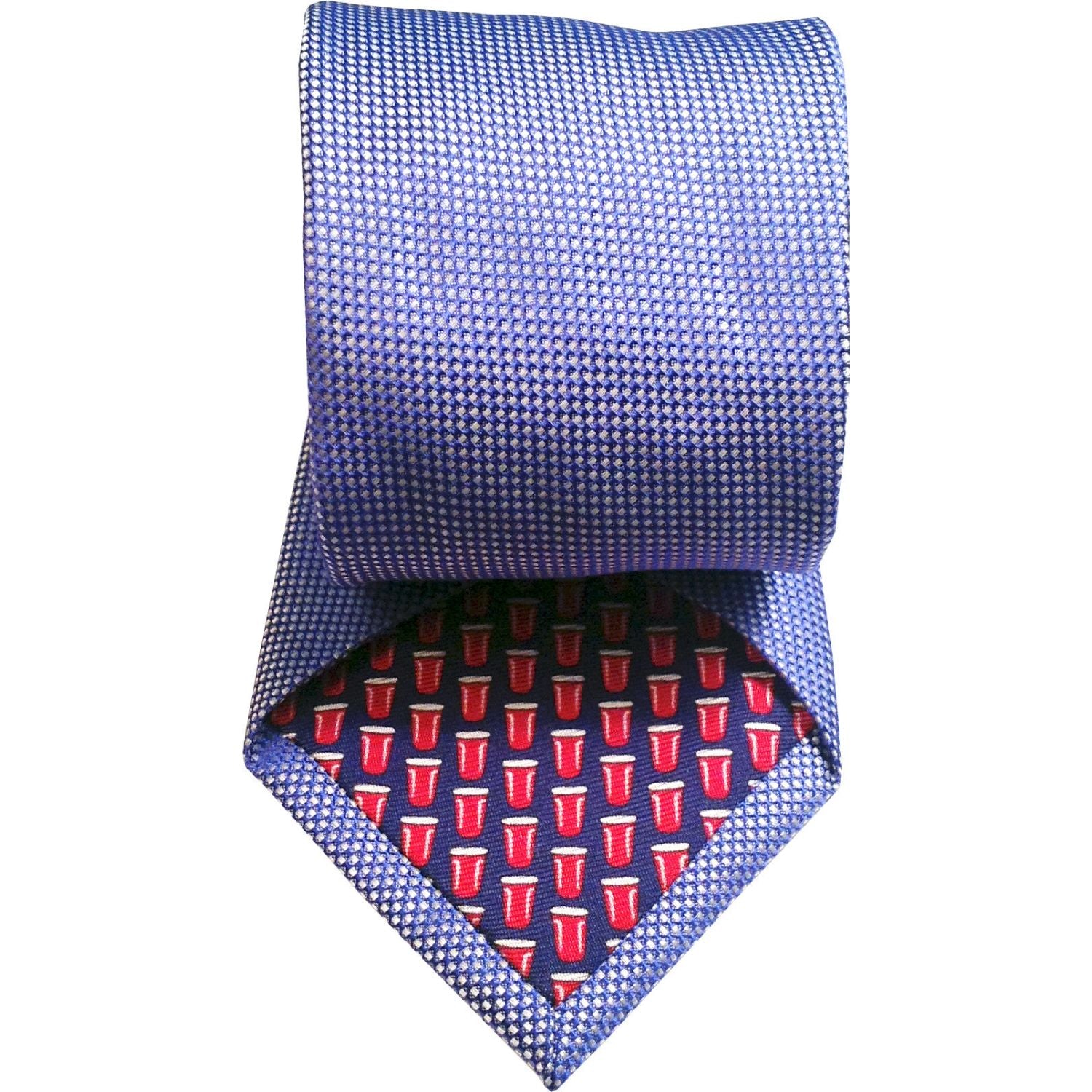 Blue patterned tie with a red and white design on a white background