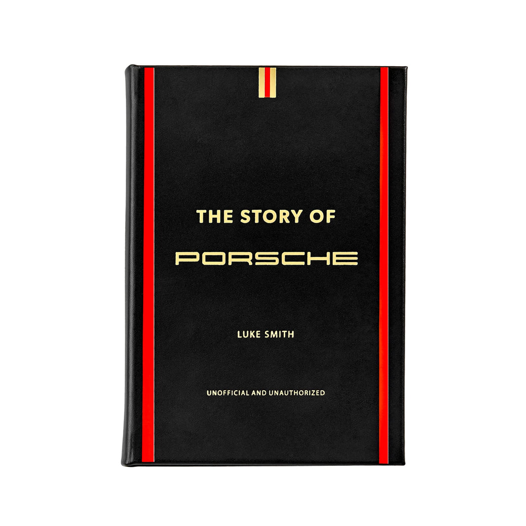 A black book titled 'The Story of Porsche' by Luke Smith, featuring a leather cover with red and white stripes.