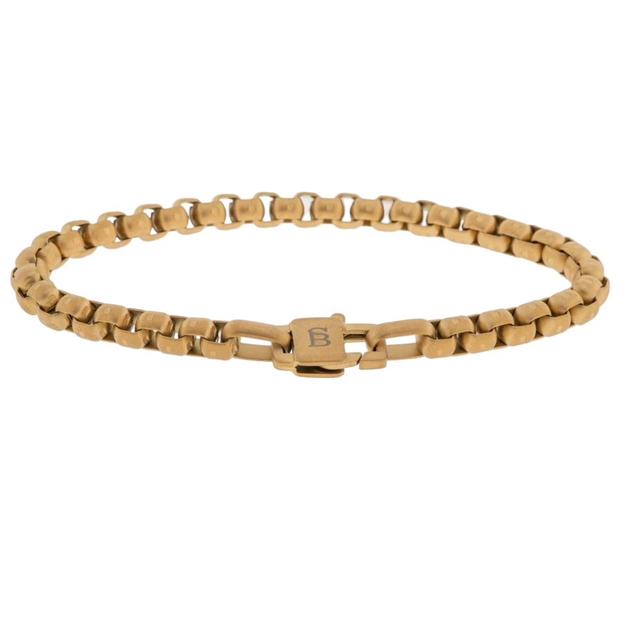 Gold bracelet with a visible brand logo on a white background