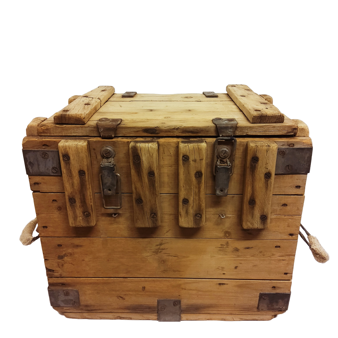 A weathered wooden wine storage crate with a hinged lid and metal accents, featuring two loop handles on the sides.