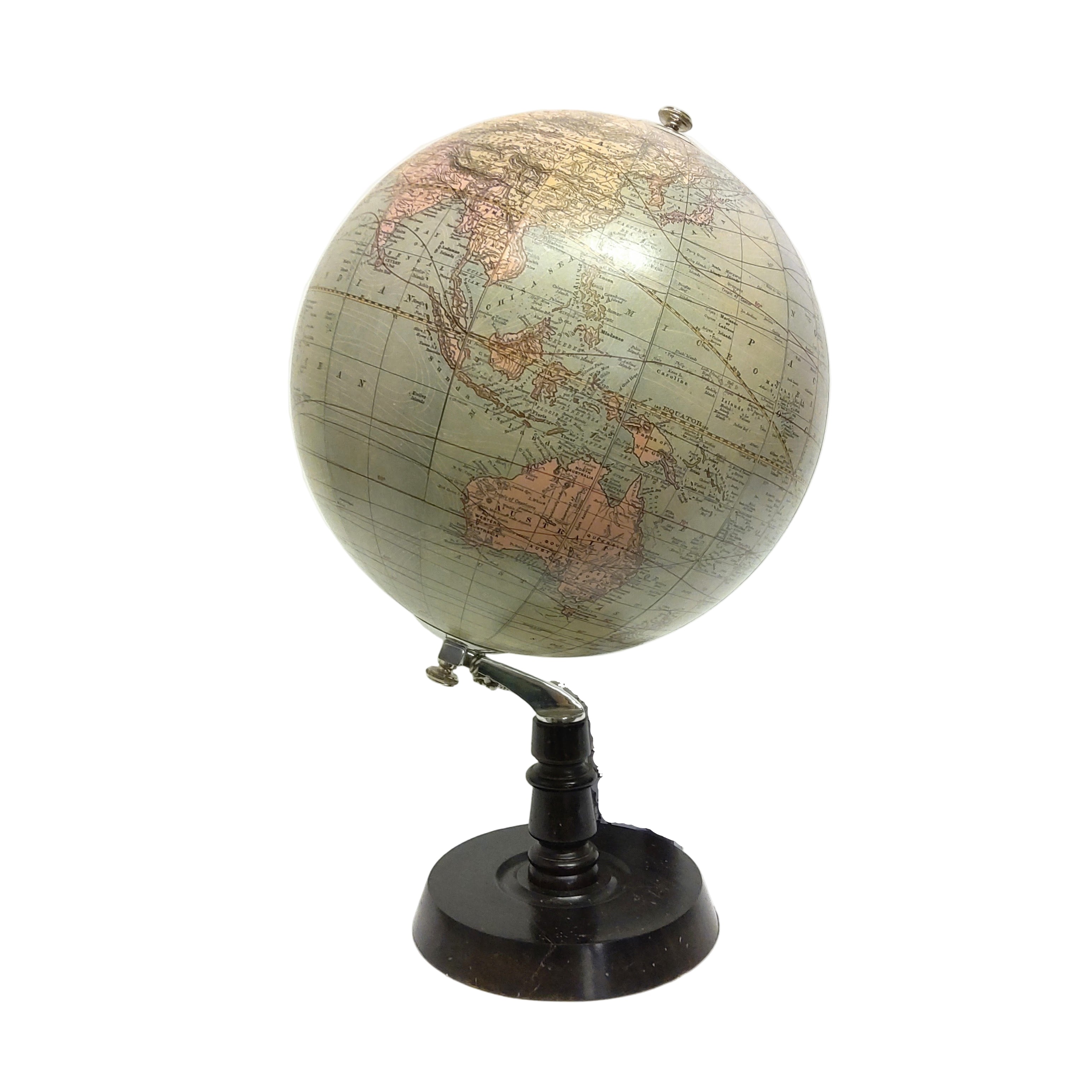 A stylish Chicago deco globe with a wooden base, featuring a map of the world on a silver and black stand.