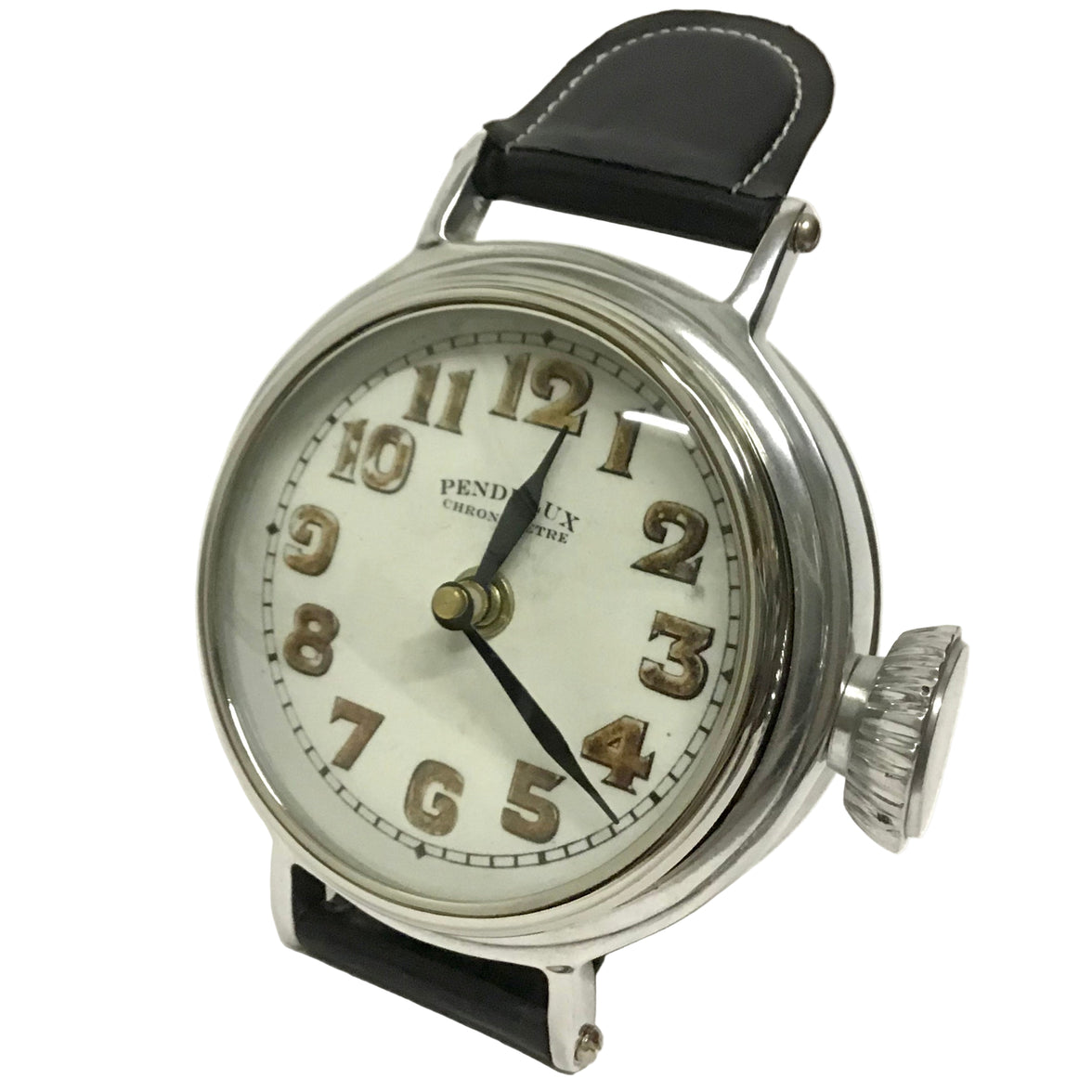 A silver wristwatch-style table clock with a white face, black leather straps, and a visible pendulum behind a clear glass.
