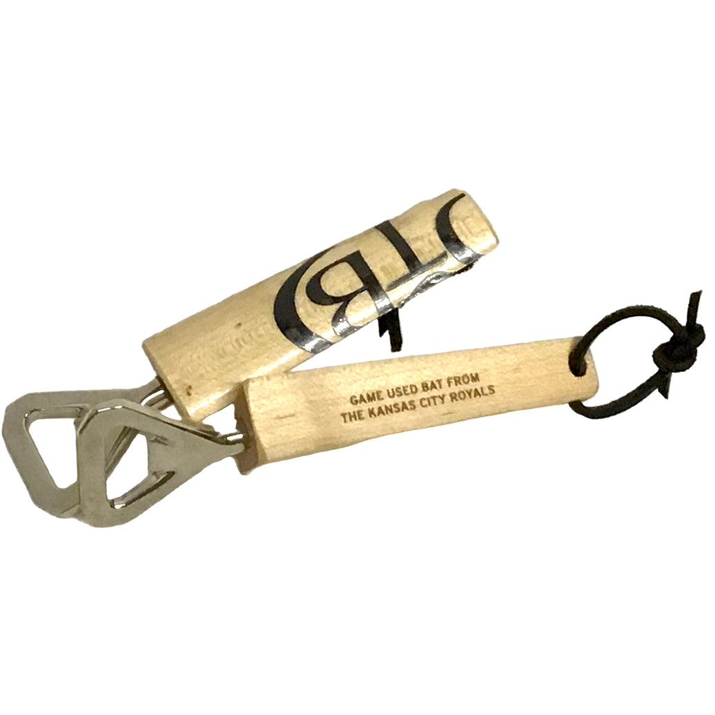 A bottle opener made from a game-used Kansas City Royals broken bat, with nickel-plated hardware and a natural wood finish.