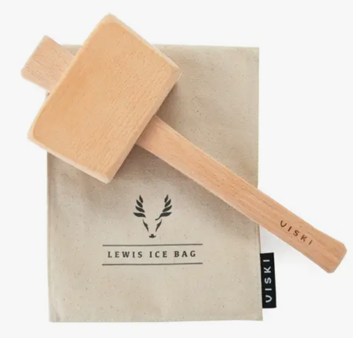 A wooden ice mallet on an ice bag with a Viski tag and the words "Lewis Ice Bag"