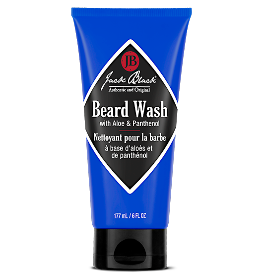 A tube of Jack Black Beard Wash with aloe and panthenol, net wt 6 oz (175 g). The packaging is predominantly blue with white and black text.