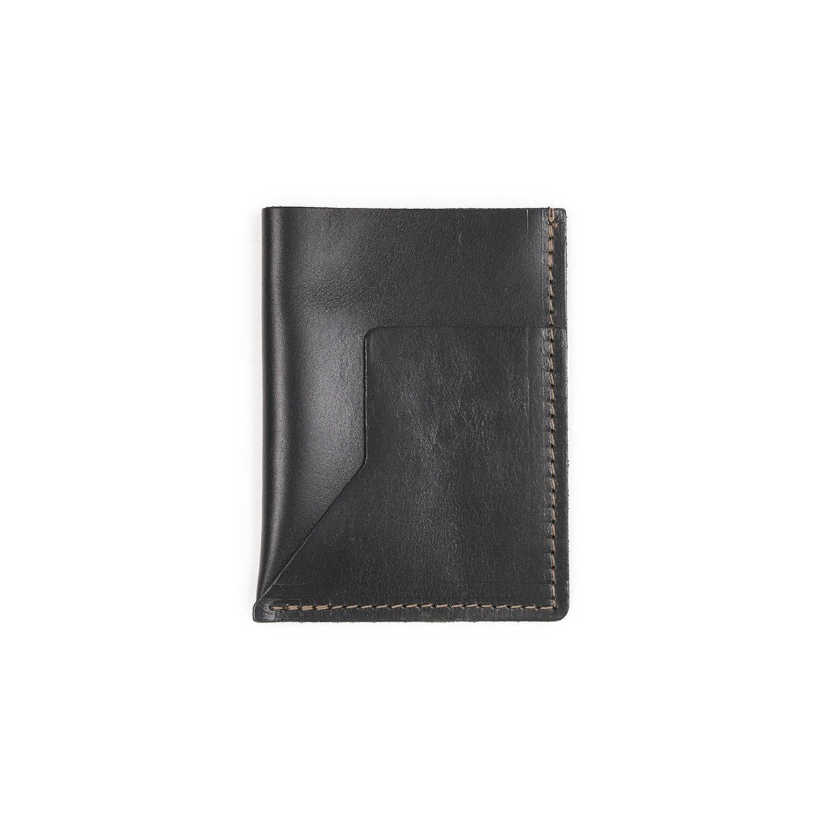 A black leather passport sleeve on a white background.