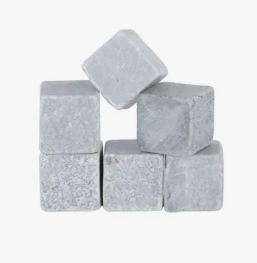 A group of gray soapstone cubes, designed to be used as drink chillers.