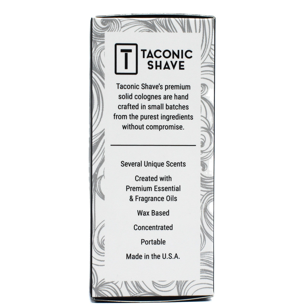 The side of Taconic Shave Bay Rum Solid Cologne packaging with text describing the product, including that it is made in the USA.